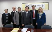 Members of Scientific Advisory Committee in meeting with Prof. Benjamin Wah, Provost (3rd from right)
